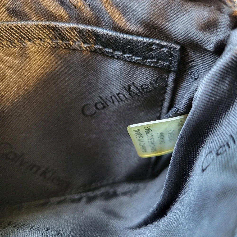 Calvin Klein Black Saffiano Leather Wristlet Pouch Zip Top Wallet Silver Logo
